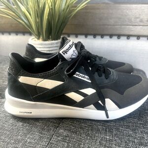 Black with white detail, Reebok, tennis shoes, size 8 1/2 worn three times!